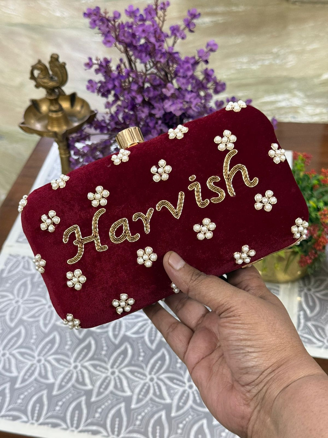 Handcrafted pearl and gold embroidered bridal clutch for Indian weddings and festive occasions