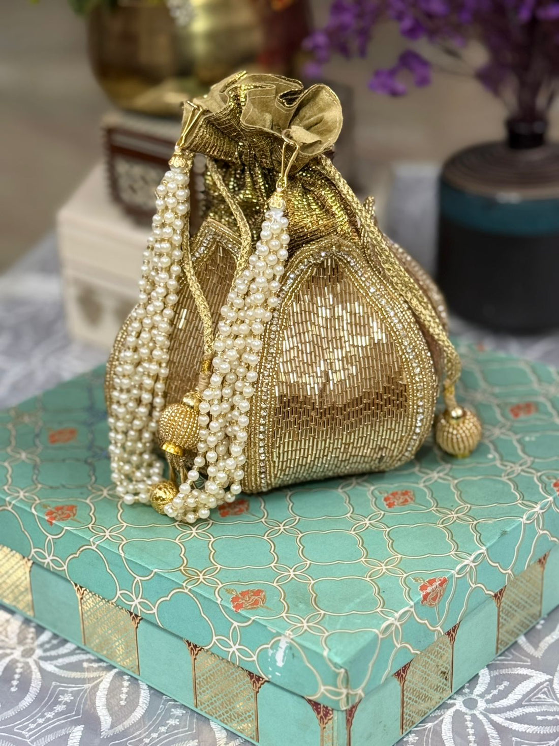 Hand embroidered lotus potli for elegant Indian wedding return gifting