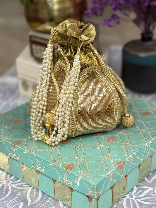 Hand embroidered lotus potli for elegant Indian wedding return gifting