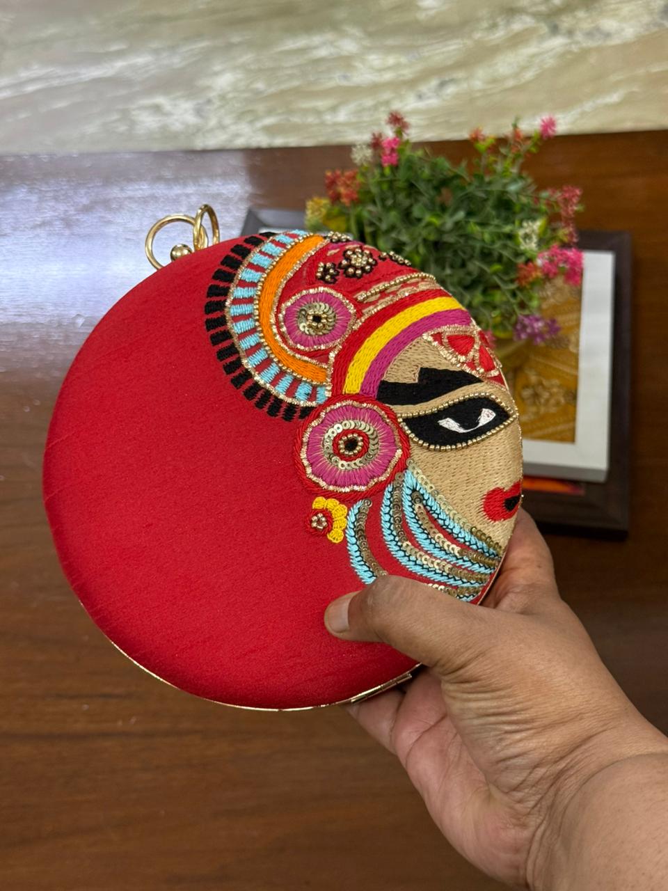 Hand Embroidered Kathakali Face Round Clutch | Traditional Art Clutch in Red & White