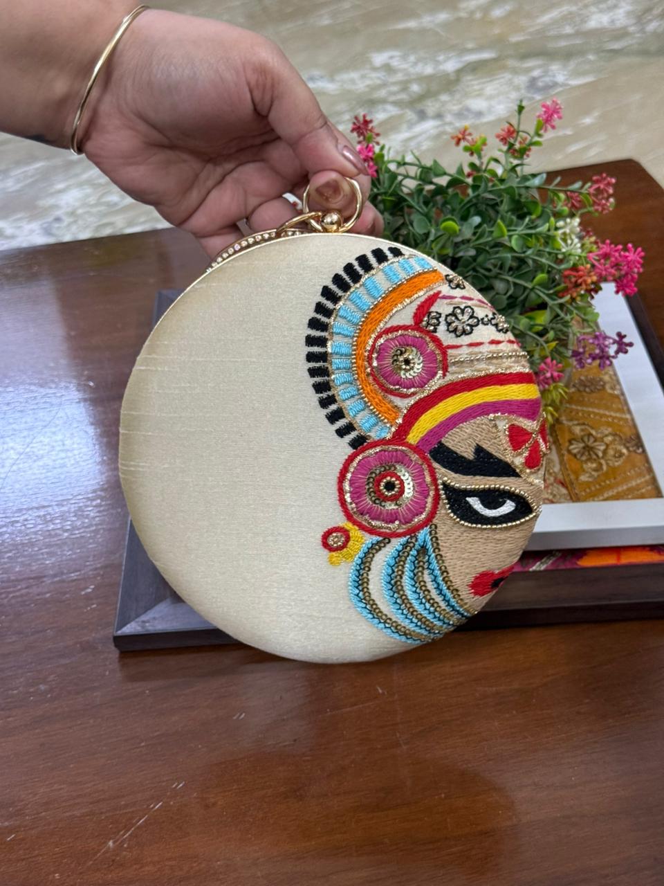 Hand Embroidered Kathakali Face Round Clutch | Traditional Art Clutch in Red & White