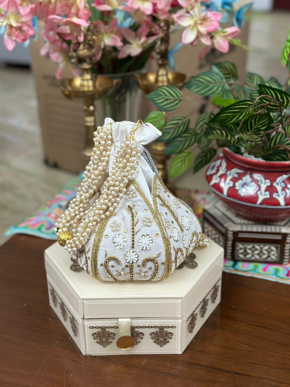 Hand Embroidered Lotus Potlis