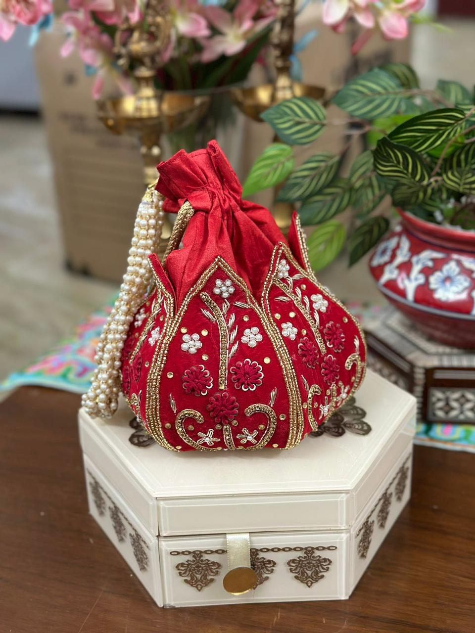 Hand Embroidered Lotus Potlis