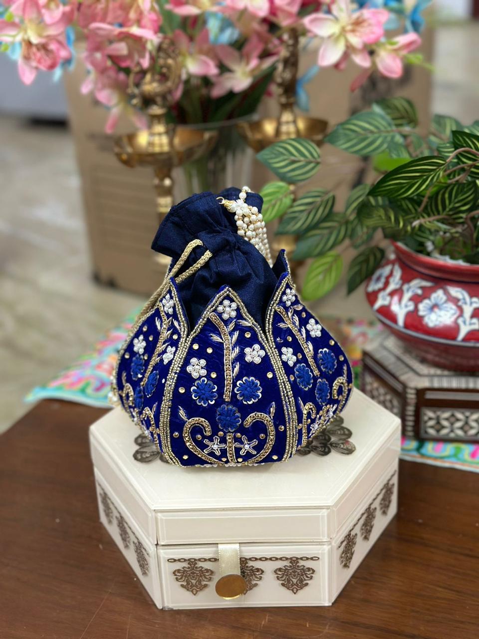 Hand Embroidered Lotus Potlis