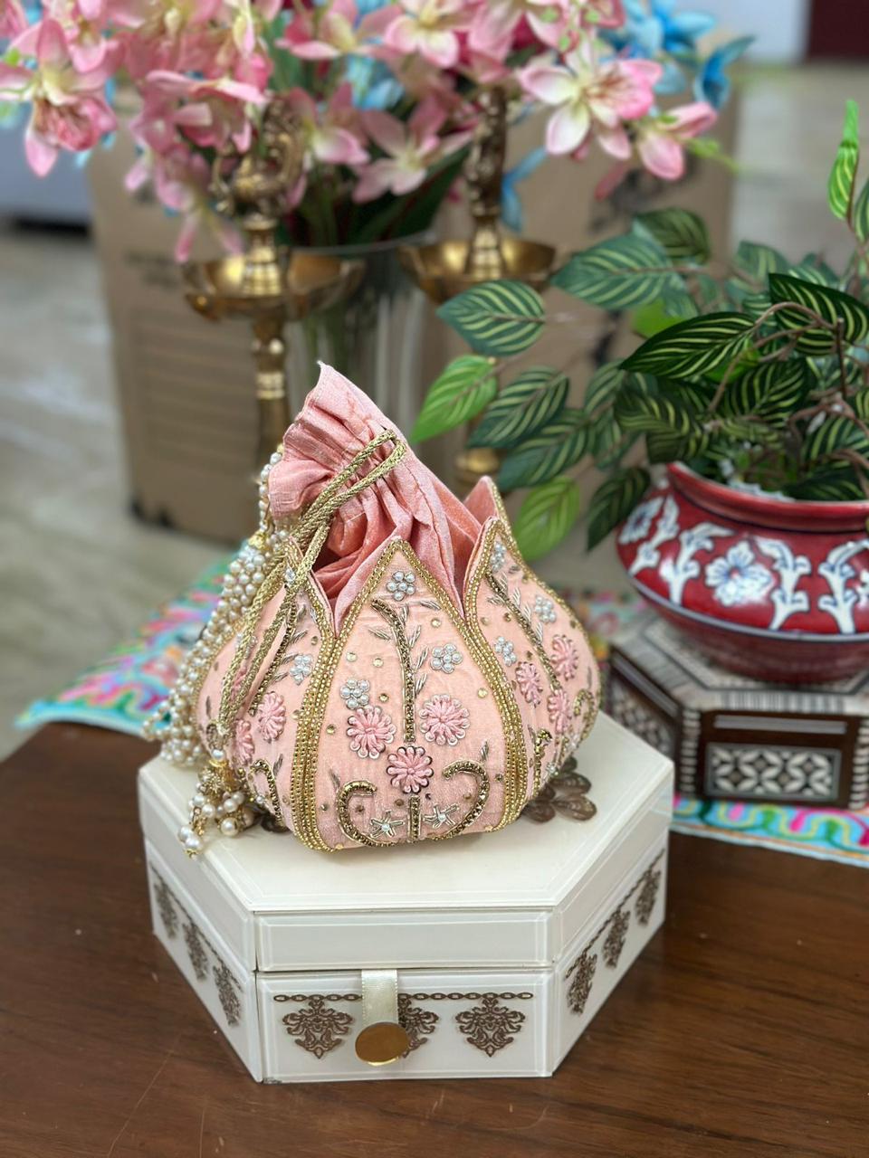 Hand Embroidered Lotus Potlis
