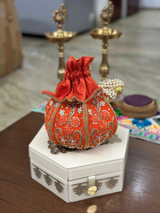 Hand Embroidered Lotus Potli – luxury wedding potli with lotus motif embroidery from Perfect Cutt