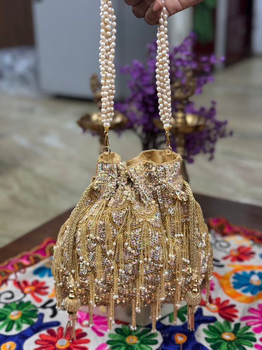 Gold Sequin & Embroidery Potli Bag with Pearl Handle & Tassel Details | Handcrafted Wedding Clutch