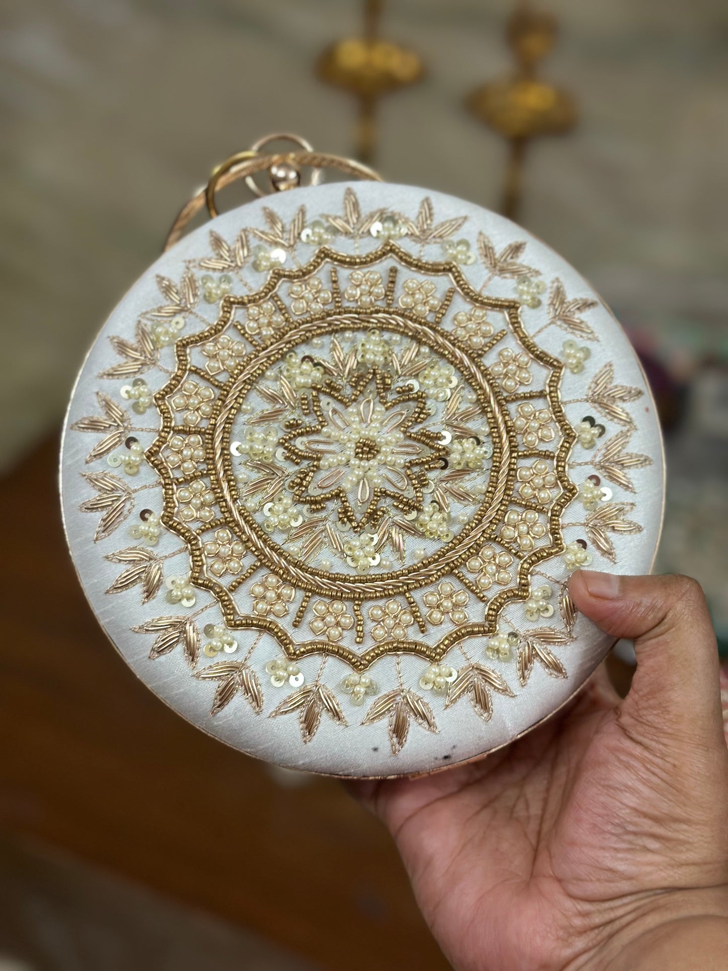 Mandala design embroidered clutch