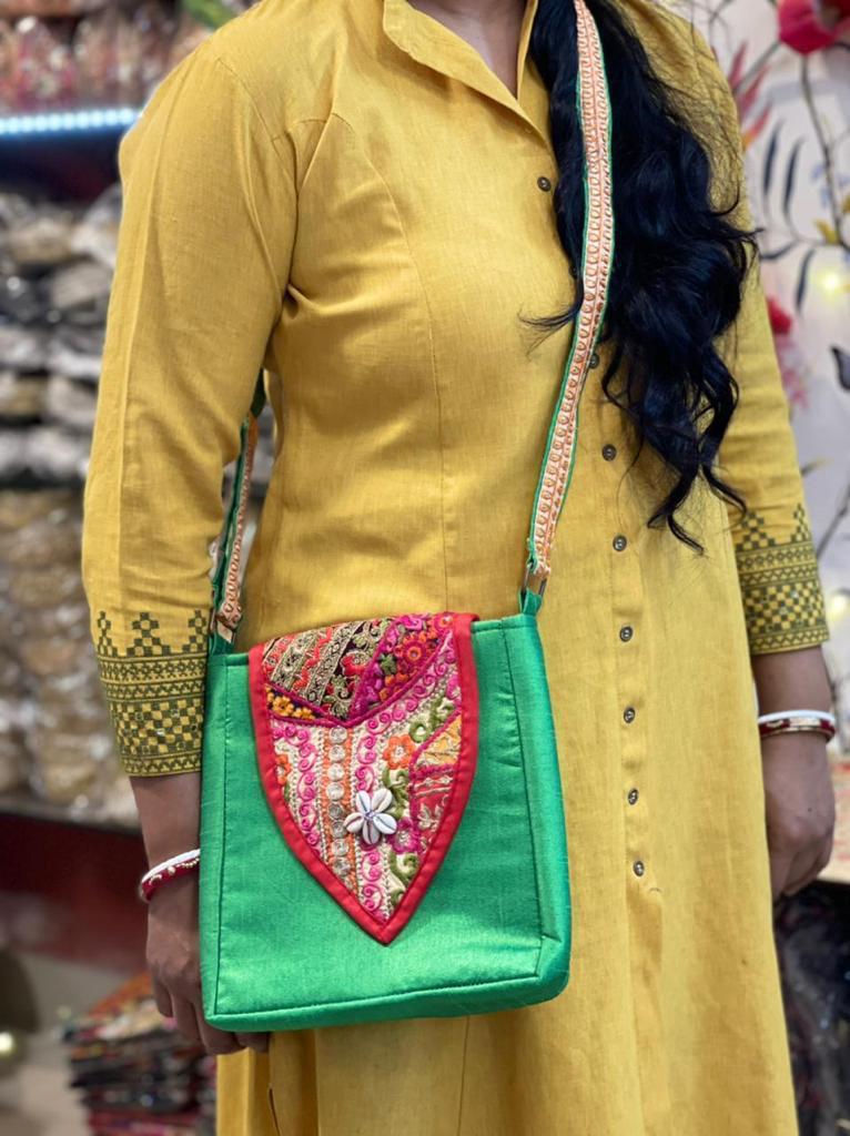 Banjara Patch Silk Sling Bag – colorful embroidered silk sling with tribal motifs from Perfect Cutt