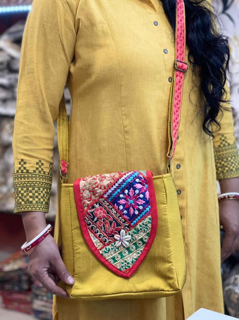 Banjara Patch Silk Sling Bag – colorful embroidered silk sling with tribal motifs from Perfect Cutt
